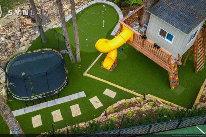 SYNLawn Bermuda residential backyard treehouse trampoline